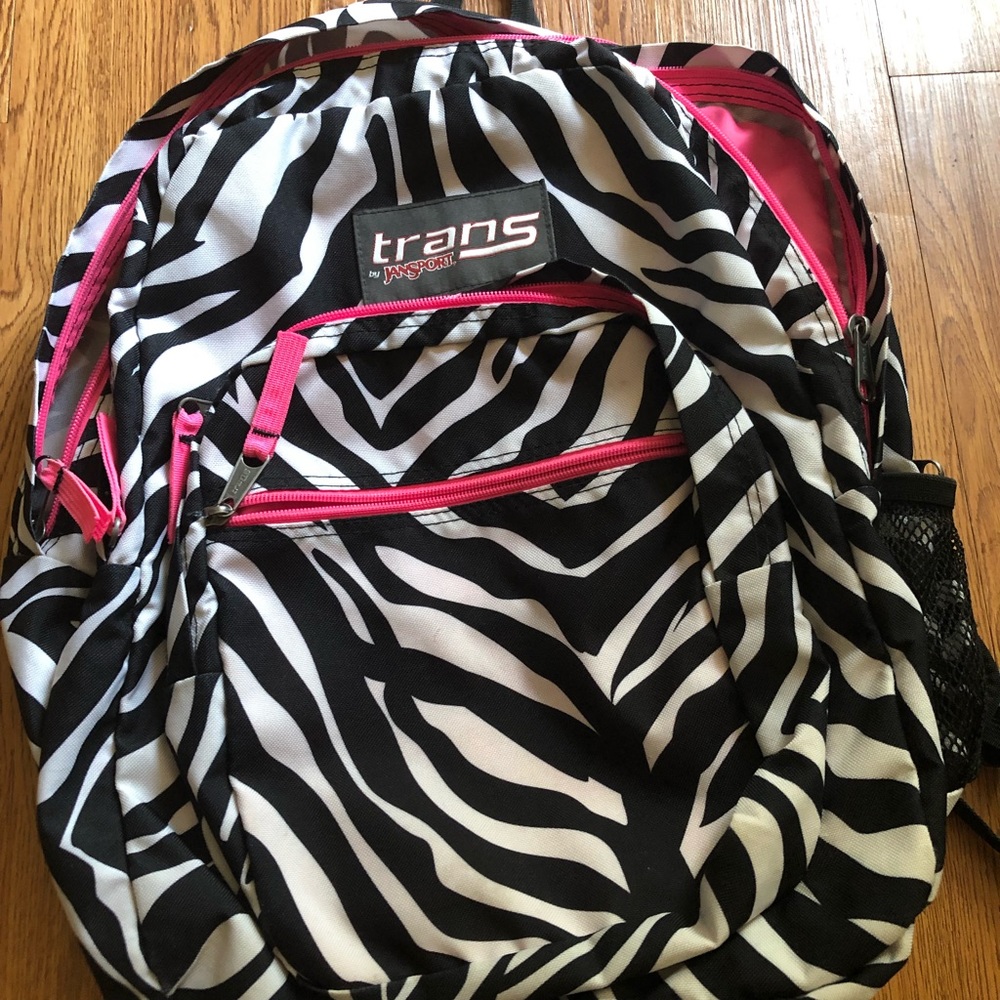Zebra print with pink jansport backpack